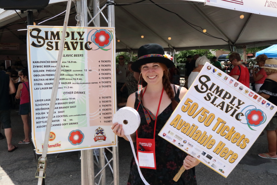 Raffle ticket station with a simply slavic volunteer